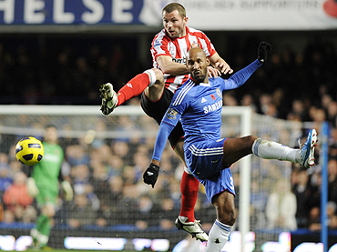 Sunderland's Phil Bardsley (left) and Chelsea's Nicolas Anelka are involved in an aerial duel during their match on Sunday