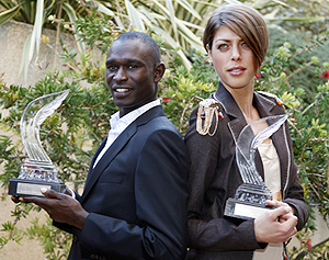 Rudisha and Vlasic with their trophies