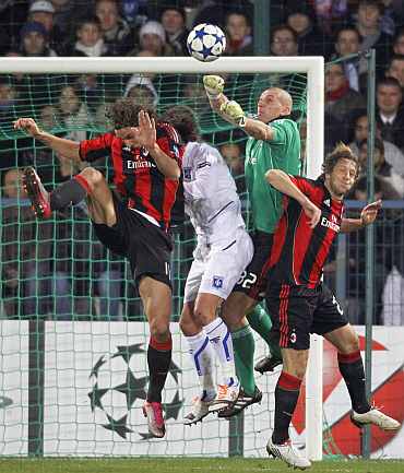 AC Milan's Goalkeeper Abbiati jumps to make a save during their match against AJ Auxerre in Auxerre