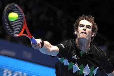 Andy Murray in action against Roger Federer during their match at the ATP World Tour Finals in London