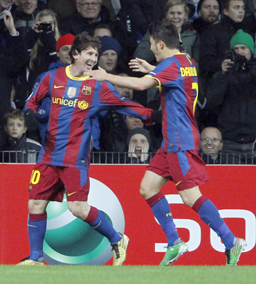 Lionel Messi with David Villa