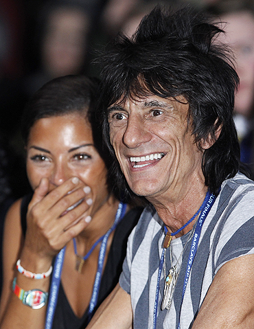 Member of the Rolling Stones Ron Wood (right) and girlfriend Ana Araujo watch the finals between Rafael Nadal and Roger Federer at the ATP World Tour Finals in London on Sunday