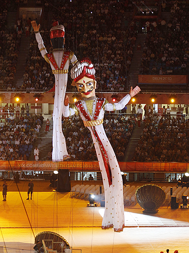 Giant puppets displayed inside the Jawaharlal Nehru stadium during the Commonwealth Games opening ceremony