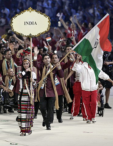 India's flag-bearer Abhinav Bindra leads the Indian contingent at the opening ceremony