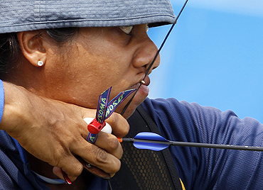Sri Lanka's Dilhara Lahiru Prasadini Salgado in action during the qualification heats for the women's 70m archery event