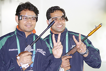 India's Deepak Sharma and Omkar Singh are all smiles after clinching silver in 50m pistol event