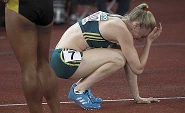 Sally Pearson reacts after being stripped of gold medal