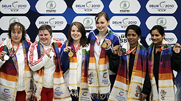 Scotland's gold medallists Jen Mclntosh (3rd from right) and Kay Copland (3rd from left) with England's silver medallists Michelle Smith and Sharon Lee and India's bronze medallists Meena Kumari and Tejaswini Sawant