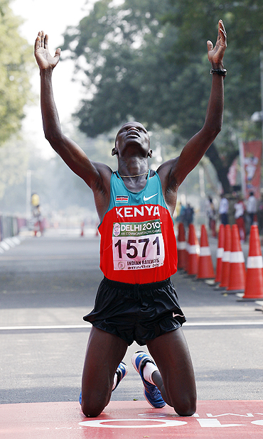 John Kelai thanks the Almighty after winning the marathon on Thursday