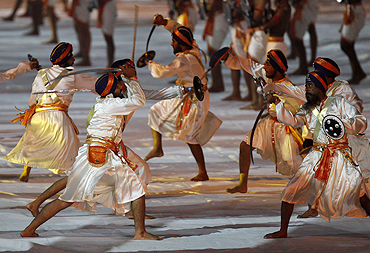 Indian Sikh artists perform during the Commonwealth Games closing ceremony on Thursday