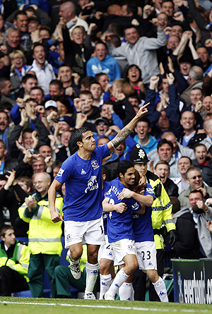 Everton's Tim Cahill celebrates after scoring against Liverpool