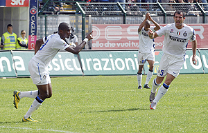 Inter Milan's Samuel Eto'o (left) celebrates with teammate Dejan Stankovic after scoring against Cagliari on Sunday