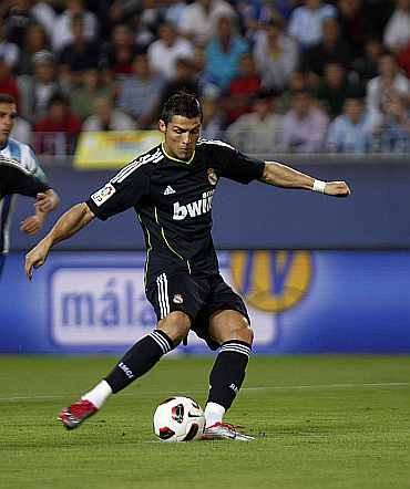 Cristiano Ronaldo shoots a penalty against Malaga