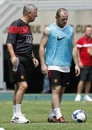 Alex Ferguson along with Wayne Rooney