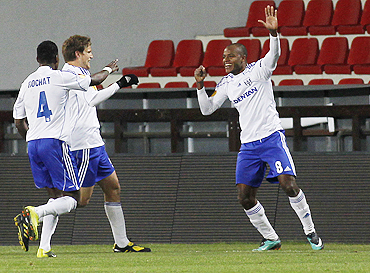 Lausanne's Silvio (right) celebrates with teammates Bigambo Rochat (left) and Jocelyn Roux after scoring against Sparta Prague