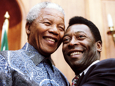 Nelson Mandela (left) with Pele