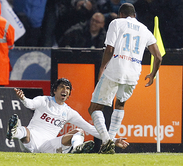 Marseille's Lucho (left) celebrates his goal with teammate Loic Remy during their Ligue 1 soccer match against Lille on Sunday
