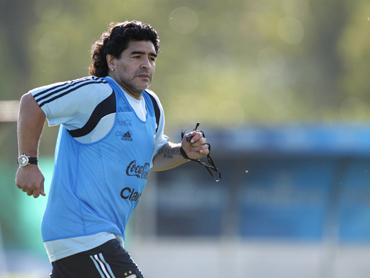 Argentina's head coach Diego Maradona attends a practice session of the team at the squad's camp in Buenos Aires