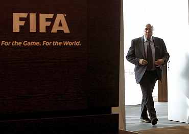 FIFA president Sepp Blatter arrives before a news conference at the FIFA headquarters in Zurich