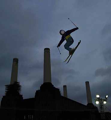 Snowboarders and freestyle skiers practice ahead of International Big Air event at Battersea power station in London