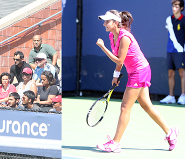 Sania Mirza is pleased as punch after her first round win while husband Shoaib Malik looks on