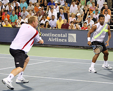 India's Leander Paes (right) and Czech Lukas Dlouhy during their opening round match on Tuesday