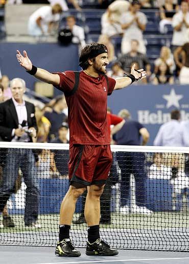 Janko Tipsarevic celebrates after defeating Andy Roddick