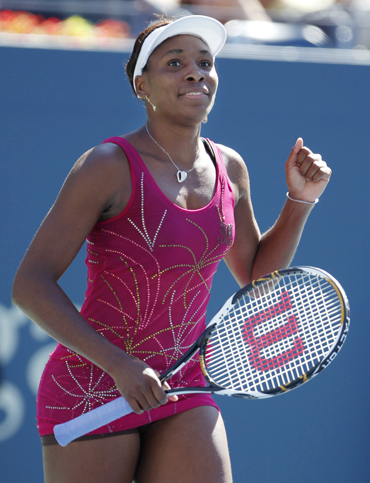 Venus Williams of the U.S. celebrates her victory against Shahar Peer of Israel