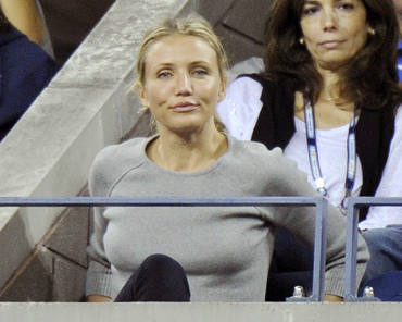 Actress Cameron Diaz watches Roger Federer in action