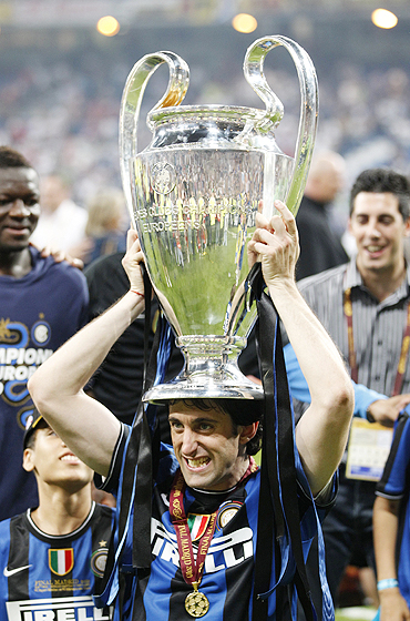 Inter's Diego Milito celebrates with the Champions League trophy