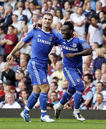 Chelsea's Michael Essien (right) celebrates with Branislav Ivanovic after scoring against West Ham United on Saturday