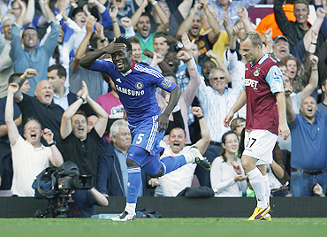 Chelsea's Michael Essien celebrates after scoring