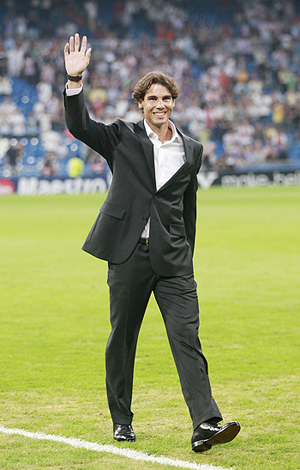 Rafa Nadal waves to the crowd at the Bernebeu stadium on Wednesday