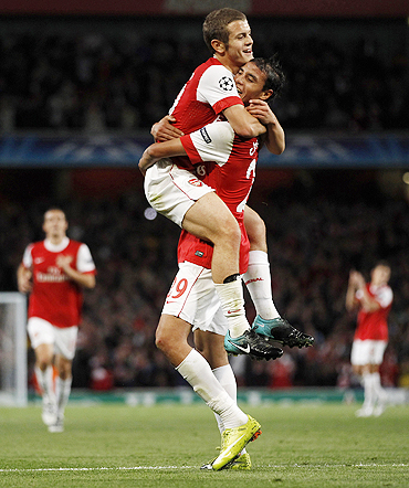Arsenal's Marouane Chamakh (right) celebrates with Jack Wilshire after scoring against Braga