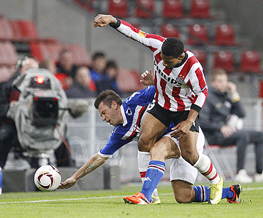 PSV Eindhoven's Jeremain Lens (right) and Sampdoria's Antonio Cassano vie for possession during their Group I Europa League match