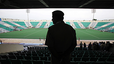 A policeman inside the Major Dhyan Chand National Stadium