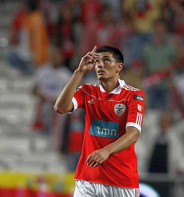 Benfica's Oscar Cardozo celebrates his goal against Sporting Lisbon