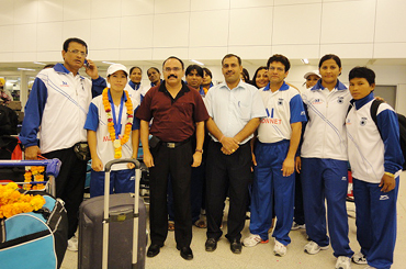 MC Mary Kom with teammates and officials
