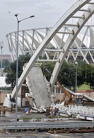 The collapsed pedestrian bridge outside the Jawaharlal Nehru Stadium.
