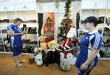 Members from the Scotland team at a handicraft store at the Games Village