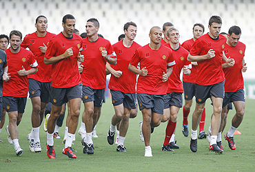 Manchester United players go through the paces during a training session in Valencia