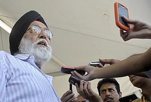 India's Sports Minister MS Gill speaks with the media at the Commonwealth Games athletes Village on Wednesday