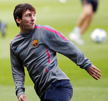 Barcelona's Lionel Messi attends a training session at Nou Camp