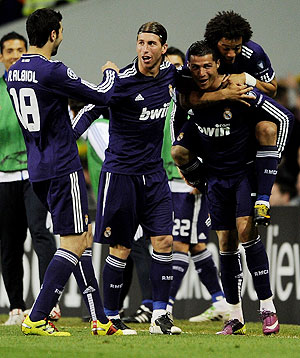 Real Madrid's Cristiano Ronaldo (right) celebrates with teammates after scoring against Tottenham Hotspur on Wednesday