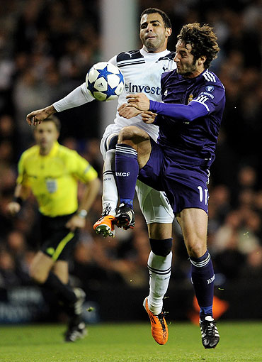 Sandro of Spurs fights for possession with Esteban Granero of Real Madrid
