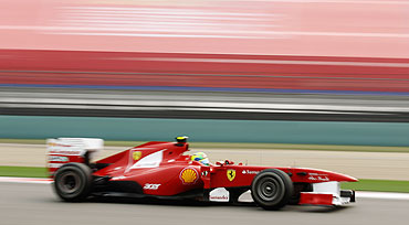 Ferrari's Felipe Massa drives during practice race of the Chinese GP on Friday