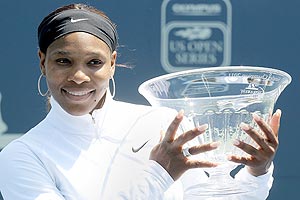 Serena Williams with the trophy after defeating Marion Bartoli for the Stanford title on Sunday
