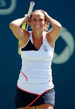 Roberta Vinci reacts after beating Caroline Wozniacki