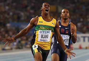 Yohan Blake celebrates winning the men's 100 metres final at the IAAF World Championships in Daegu