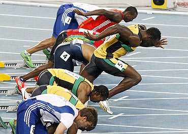 Usain Bolt makes a false start during the men's 100 metres final at the IAAF World Championships in Daegu on Sunday